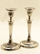A pair of English sterling silver candlesticks sold