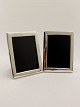 A pair of sterling silver english photo  frames sold