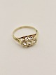 14ct gold ring . with three clear stones sold