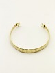18 karat gold arm bracelet
