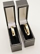 A pair of 14 carat gold design rings