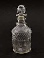 Decanter with fixed blown pattern