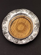 Silver-plated wine coaster with wooden base