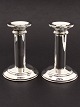 A pair of sterling silver candlesticks