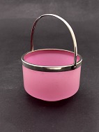 Pink colored sugar bowl