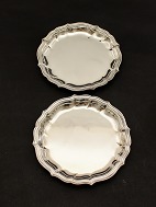 A pair of silver-plated wine trays