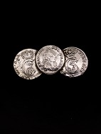 Brooch of 3 shilling coins