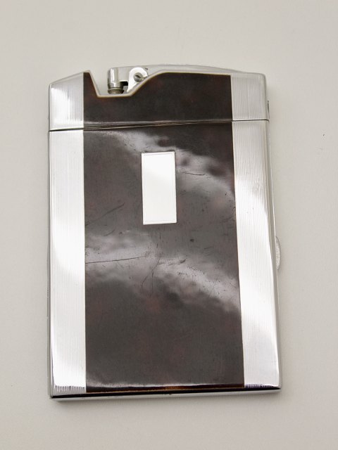 Ronson art deco lighter and cigarette case sold