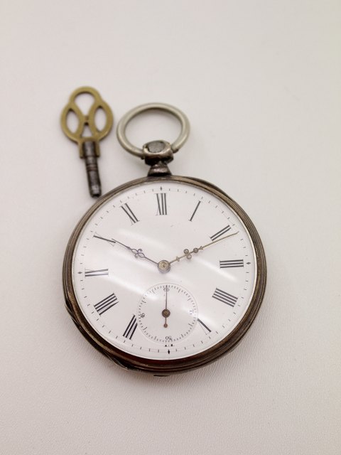Silver mens pocket watch with key winding