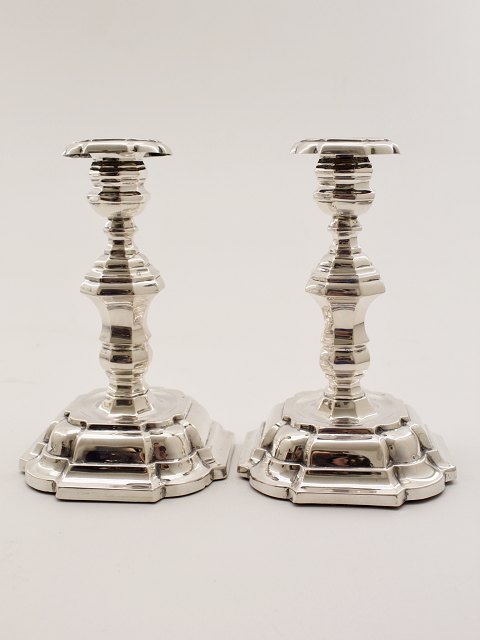 Silver candlesticks in baroque shape  sold