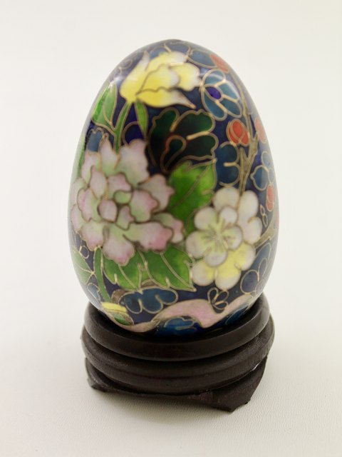 Cloisonne eggs on wooden stand sold