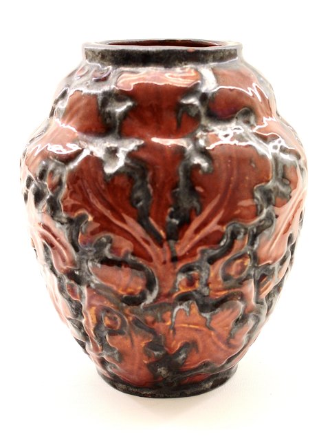 Ceramic vase  decorated with oak leaves
