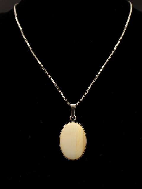 Sterling silver necklace  with ivory pendants