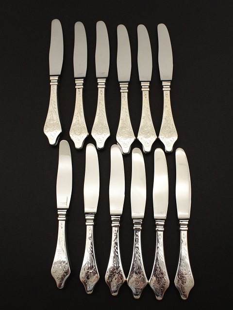 Antique rococo 830 silver knives