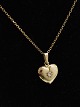 H Siersbøl 8 karat gold necklace and heart pendant