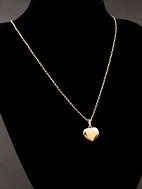 8 karat guld halskæde 52 cm. og hjerte