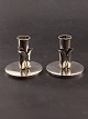 A pair of handmade 830 silver art deco candlesticks