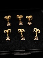 St p 6  14 karat guld restikker med diamant