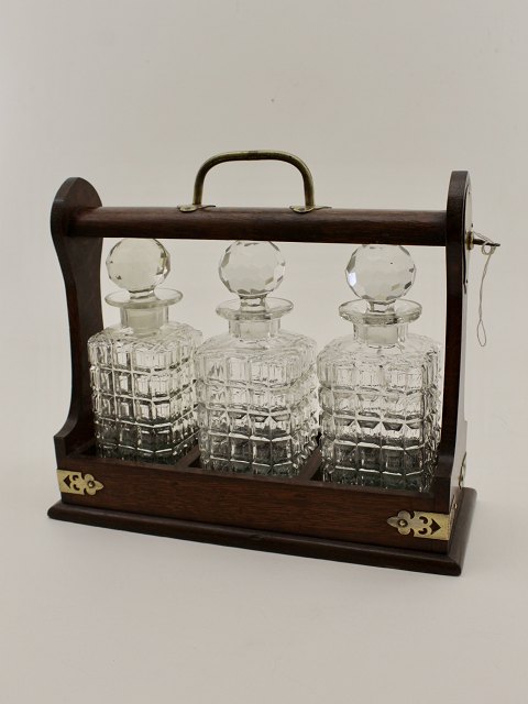 English tantalus with 3 carafes 19th century. No. 380340 sold
