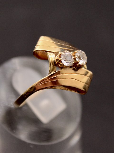 14 carat gold ring with 2 zircons